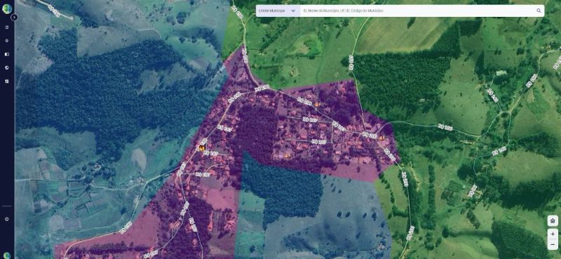 Área urbana destacada em roxo sobre imagem aérea, indicando zoneamento usado para análise territorial e arrecadação municipal.

